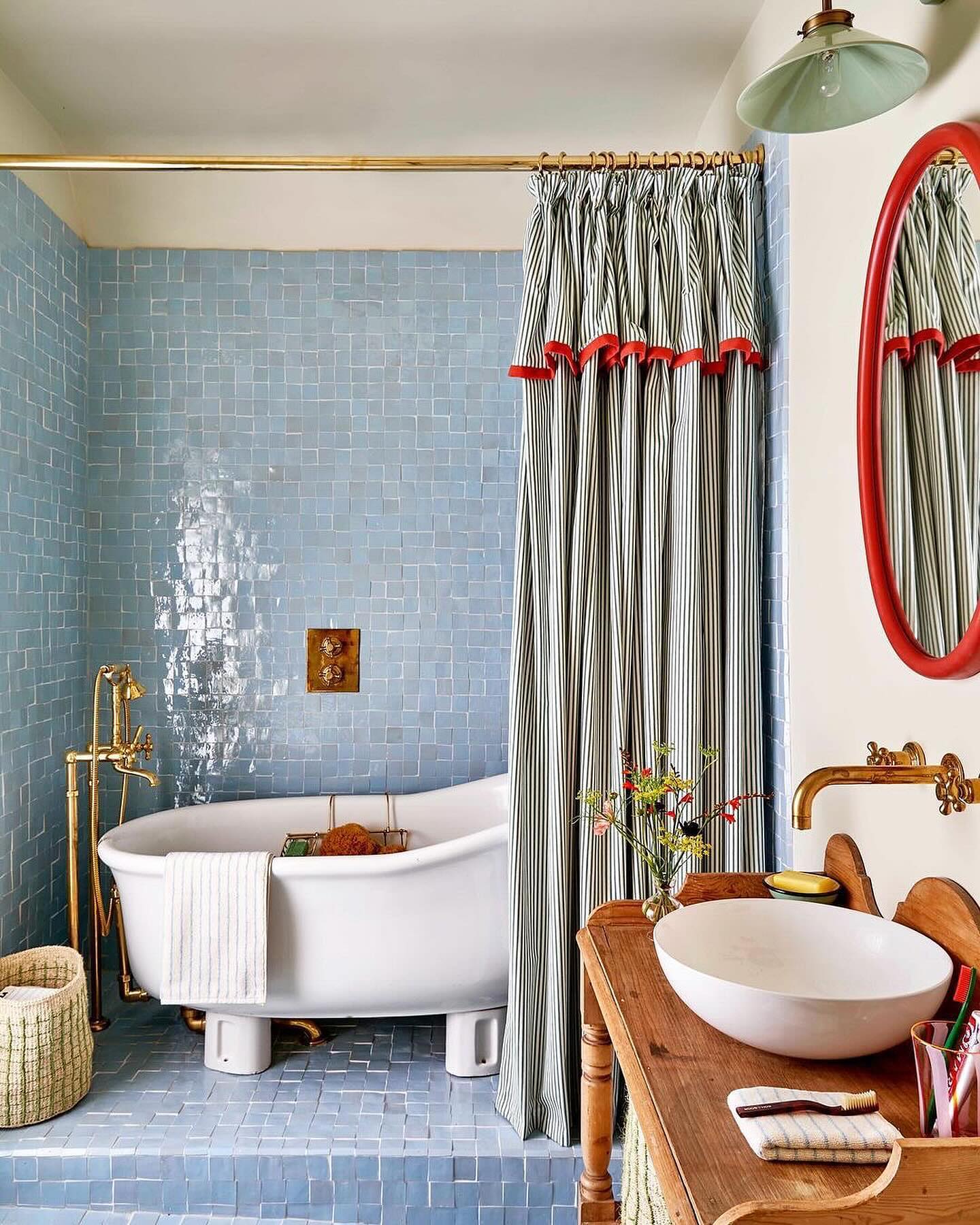 Pop of Red Against Blue Tiles